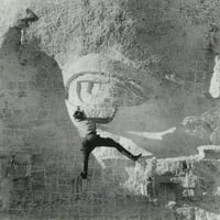 Színpadi fotó a munkásról, amely Jefferson Szemfedőjén lóg a Rushmore-hegyen. Kb. 1934. Fotó: Charles D ' Emery. Történelem